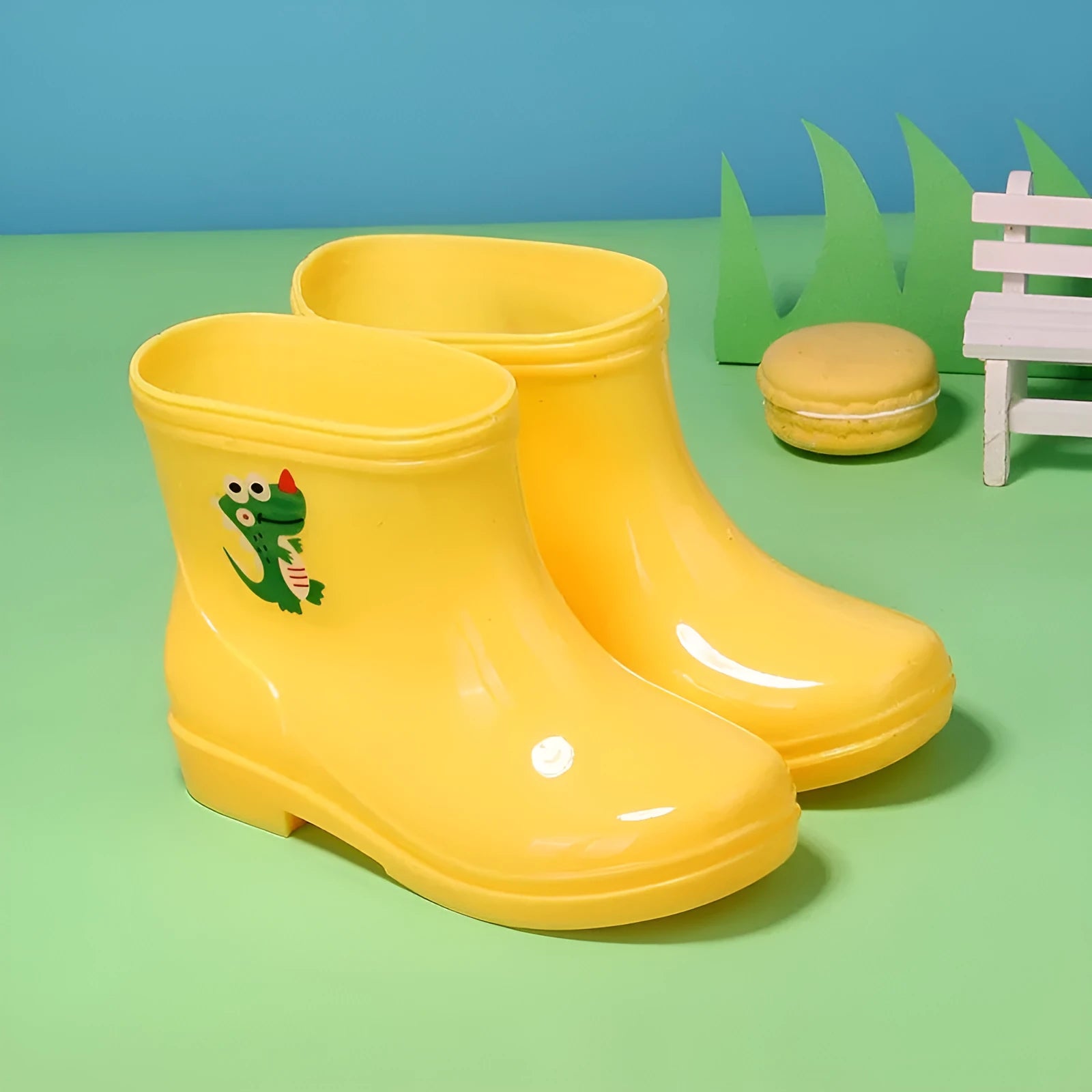 Children's non-slip rain boots in solid colour, plastic upper, mid-calf height, sizes 22-31 yards