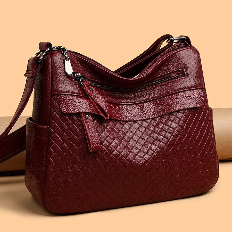 Women's soft PU leather crossbody bag in black with diamond pattern stitching, vertical rectangle shape 28x22x11cm