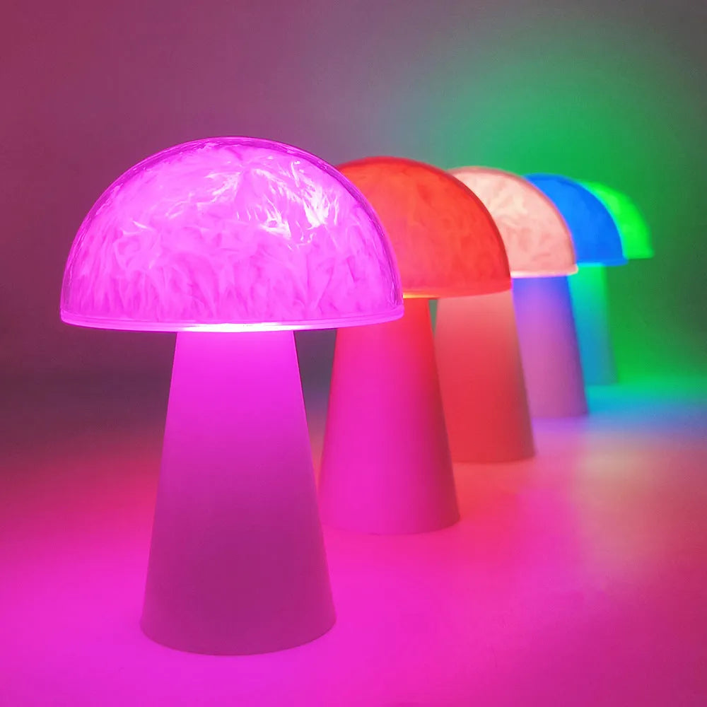 Mushroom-shaped night light with remote control showing RGB colour-changing illumination
