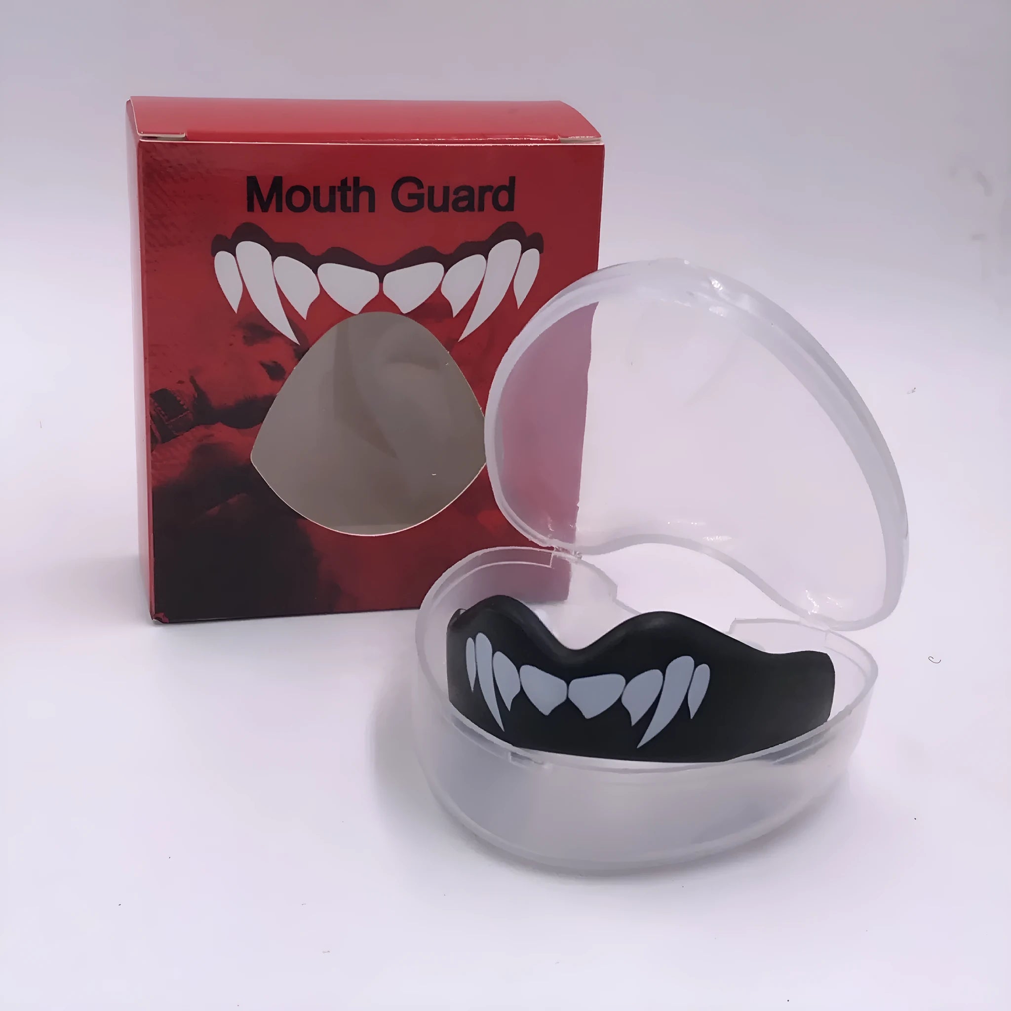 Adult boxing mouthguard with printed teeth design in black/white, red/white, and blue/white colour options