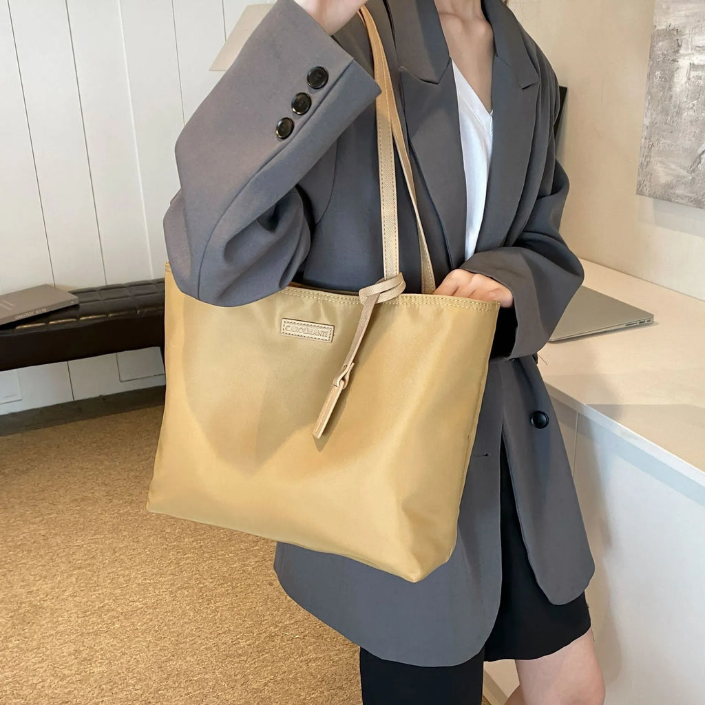 Women's large capacity soft Oxford cloth shoulder bag in black, horizontal square shape with double straps