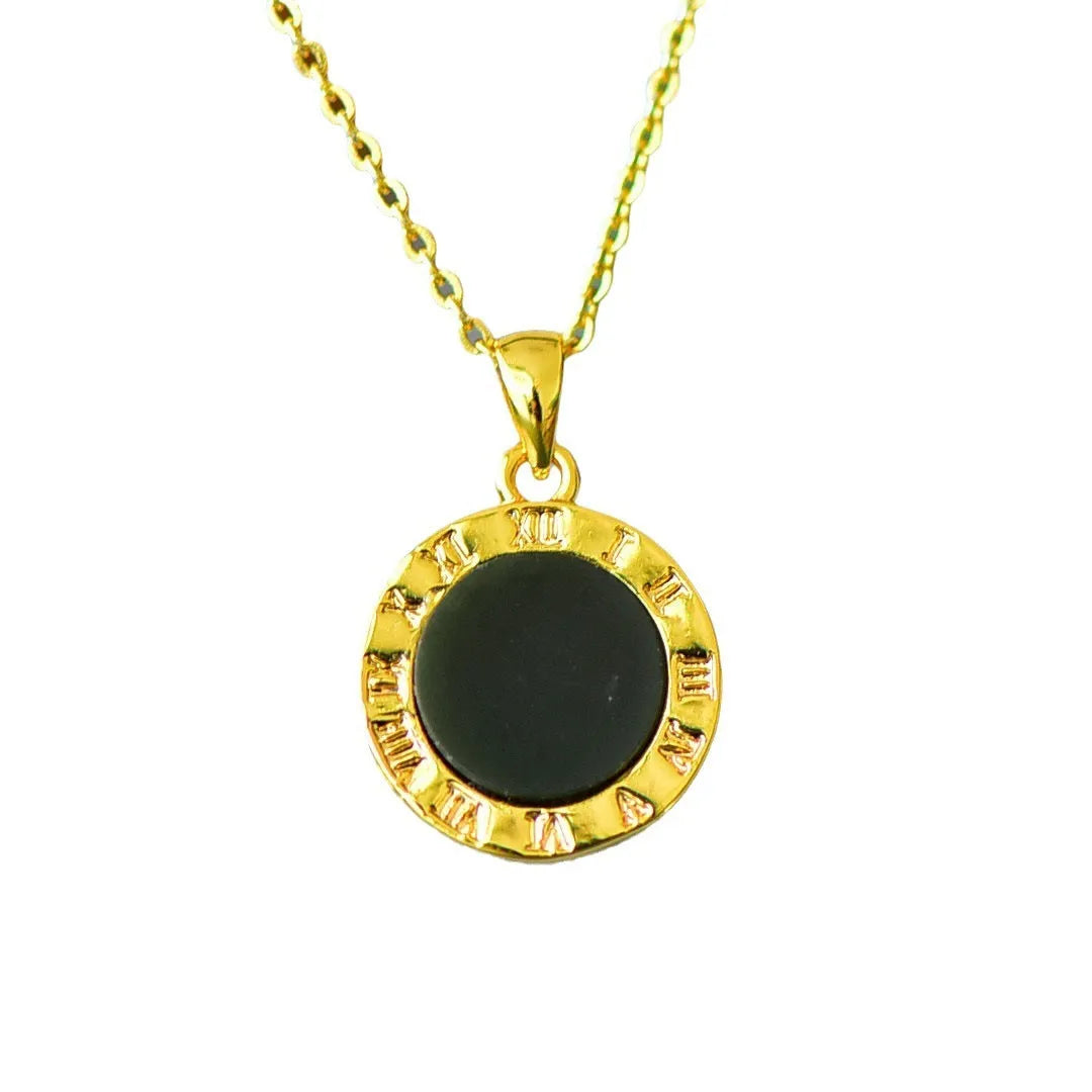 Copper inlaid natural Hetian gray and ink blue jade pendant necklace on a chain.