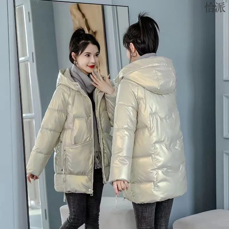 Women's loose thick winter hooded jacket in black colour with long sleeves