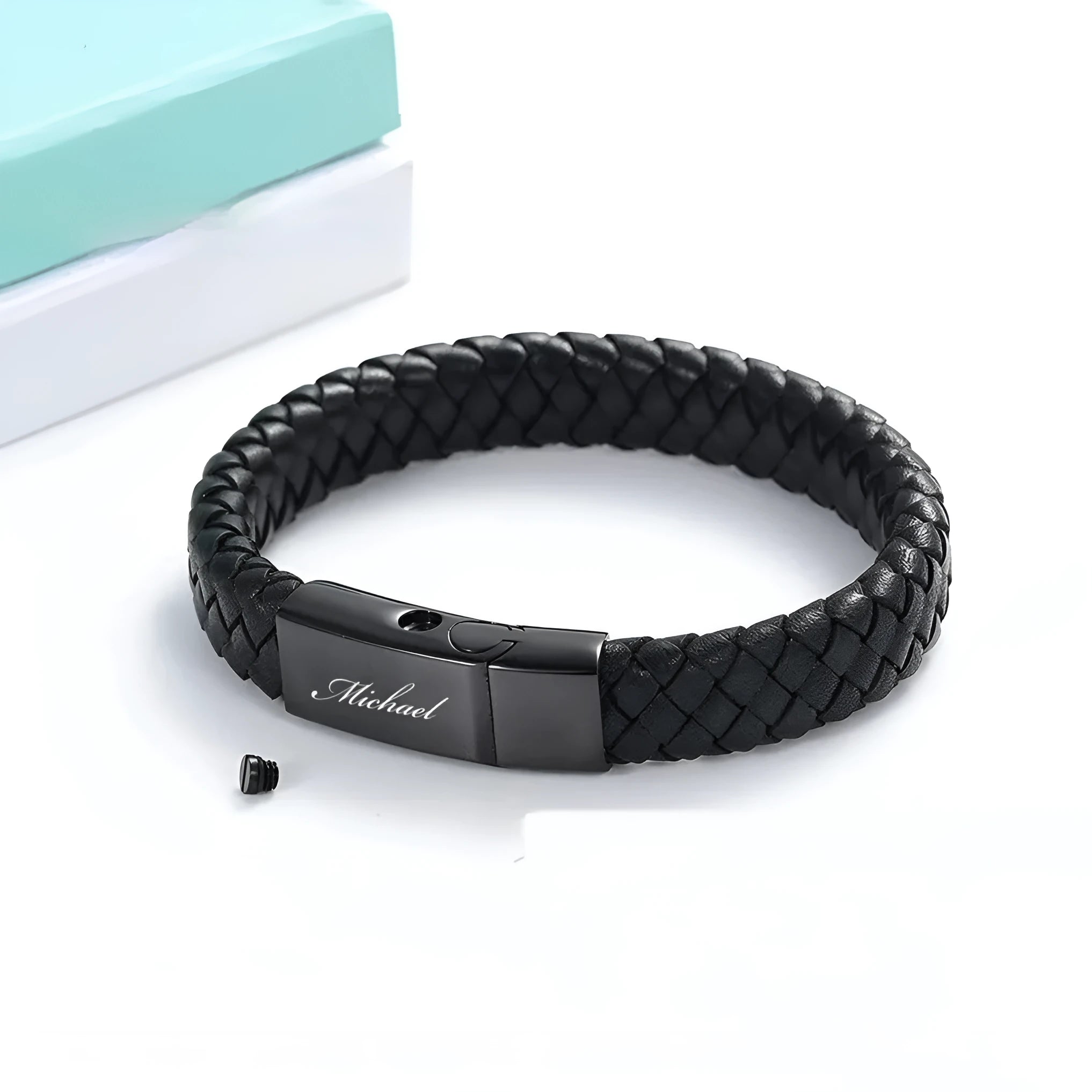 Black stainless steel memorial bracelet with woven leather design and engraved text