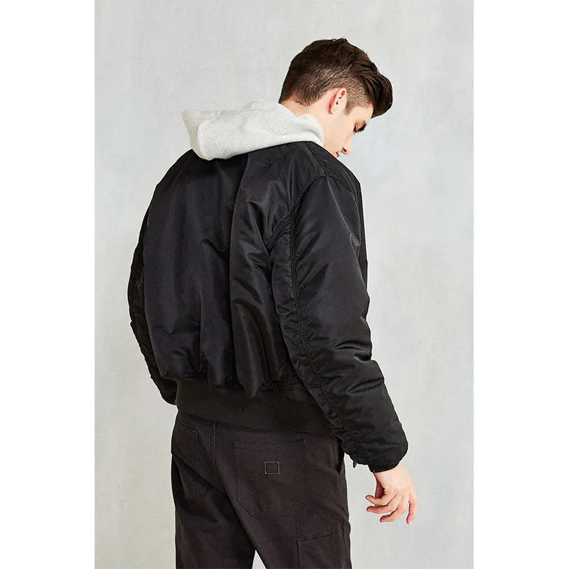 Men's army green loose-fit cotton-padded pilot jacket with double-sided wear-resistant nylon construction.