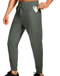 Men's loose-fit solid colour casual trousers made from polyester fabric on a hanger.