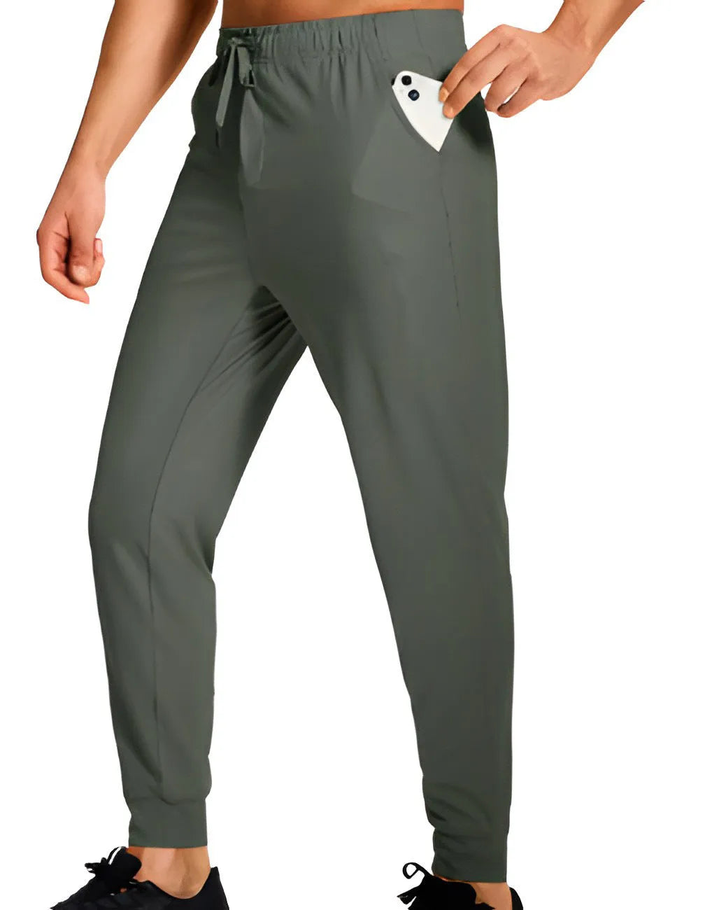 Men's loose-fit solid colour casual trousers made from polyester fabric on a hanger.
