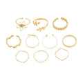Openwork flower set ring with glossy gold finish showing floral pattern detail