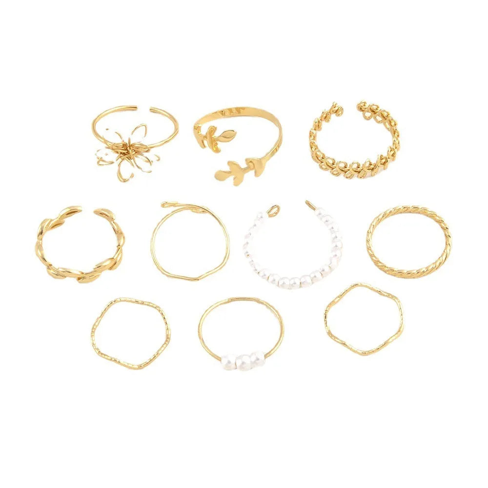 Openwork flower set ring with glossy gold finish showing floral pattern detail
