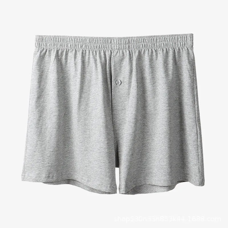 Men's light grey cotton boxer shorts with high waist and loose fit design
