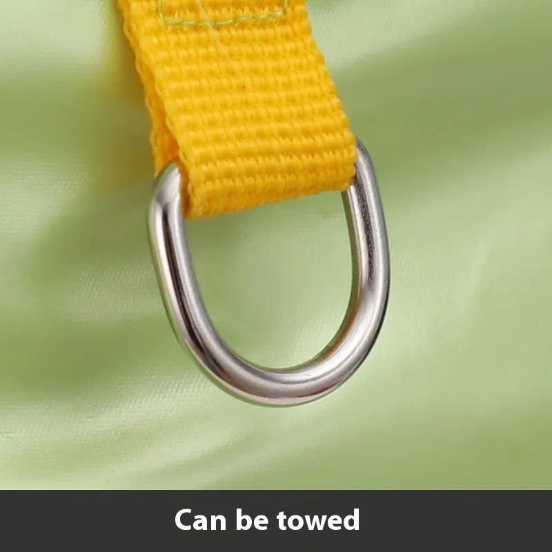 Green waterproof cotton-padded dog coat with four-legged design shown on medium-sized dog
