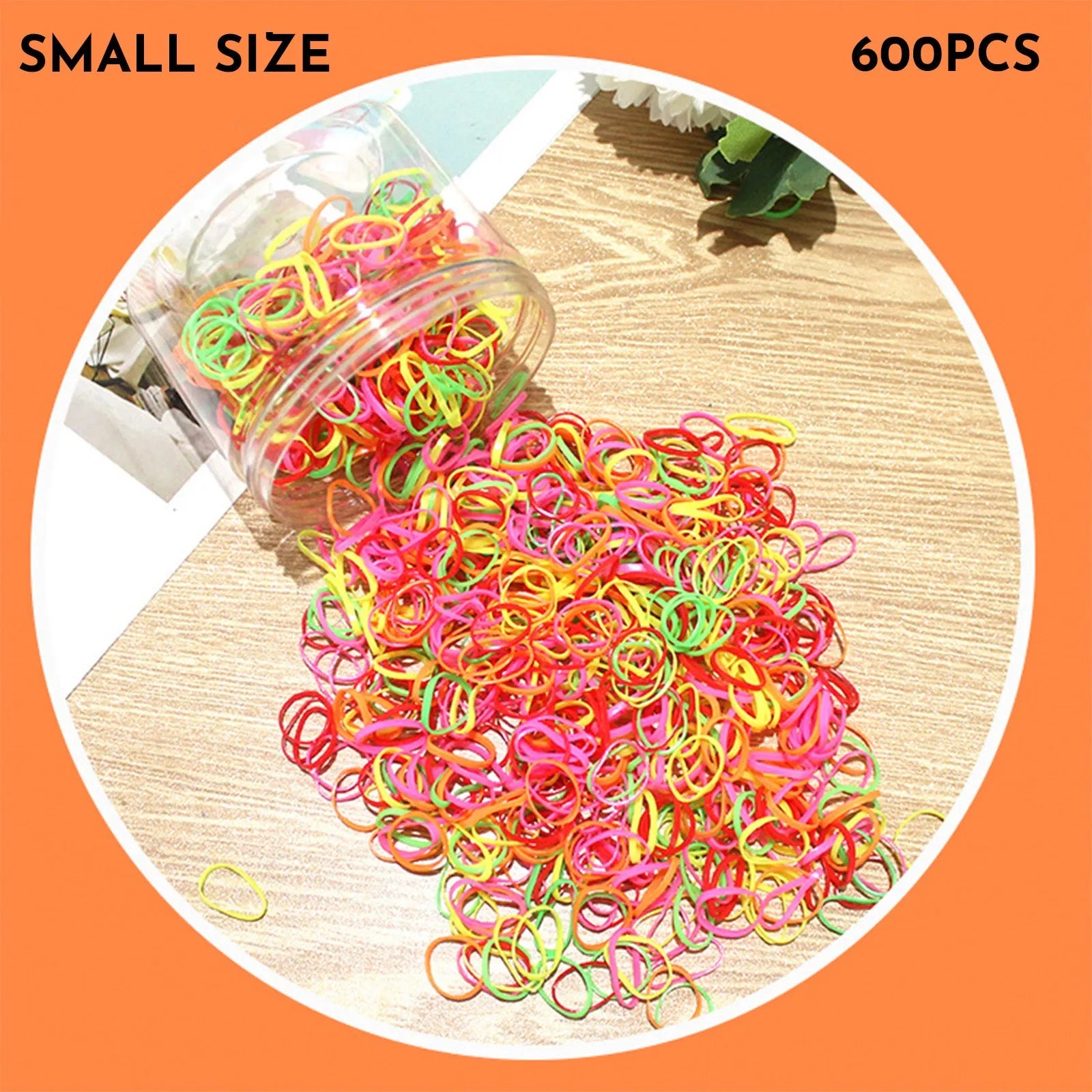 Open reusable container showing hundreds of thin, colourful TPU baby hair ties for toddlers.
