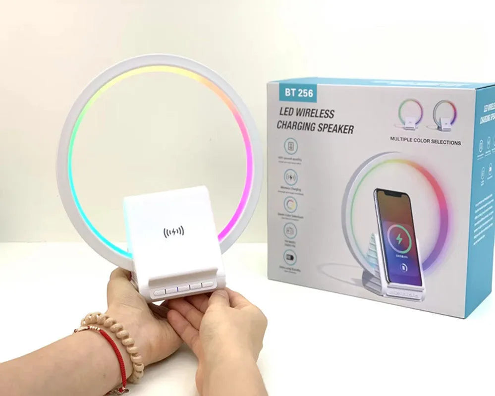 White square Bluetooth speaker with wireless charging pad and ambient LED light on top