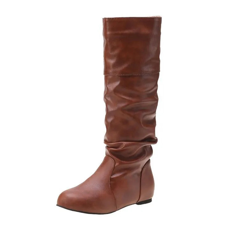 Women's black flat heel long slip-on boots with a round toe and high cylinder length.