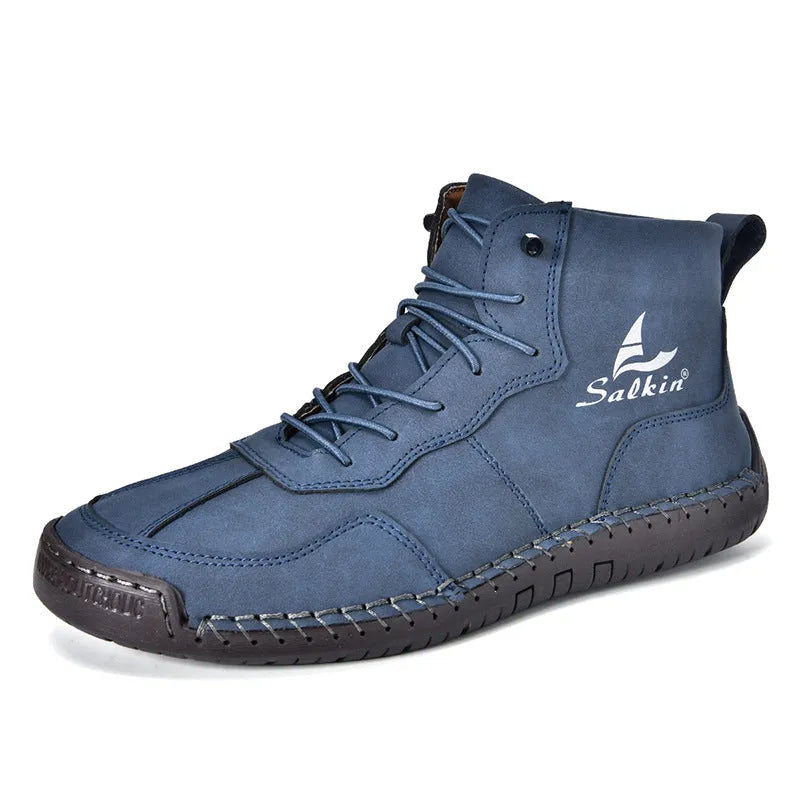 Casual high-top leather boots with elastic band closure and flat heel in beige colour with visible sewing detailing