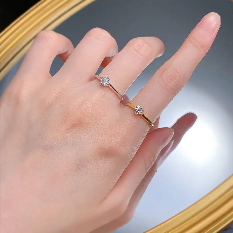 Minimalist silver crown-shaped ring with linear detailing and electroplated finish