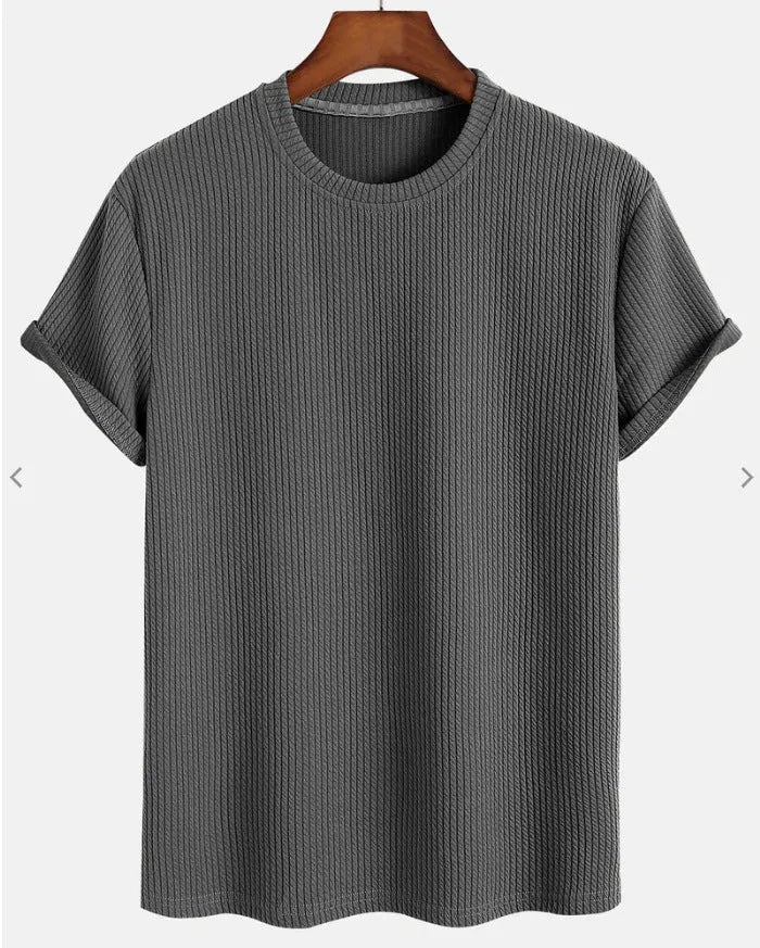 Men's solid colour loose round neck T-shirt in black, size M, on a plain background