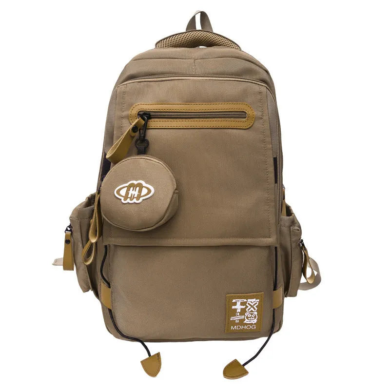 Japanese large capacity leisure travel backpack in khaki with contrast stitching and nylon waterproof finish