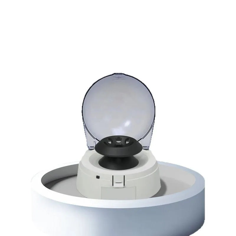 Compact laboratory mini centrifuge measuring 157x170x120mm with 7000 RPM maximum speed