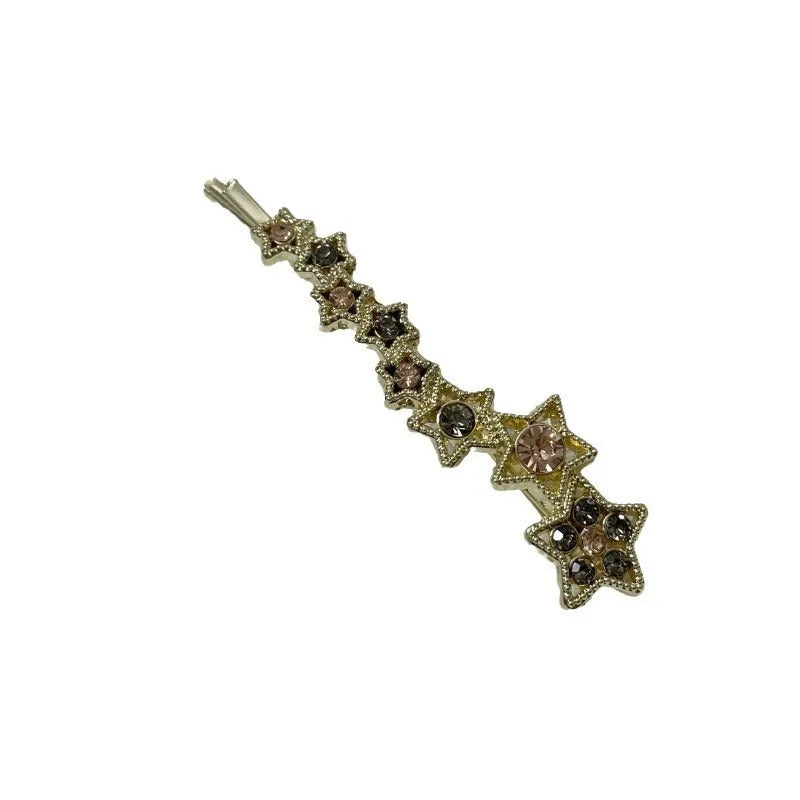 Golden electroplated hair barrette with star decoration and side clip design for bangs
