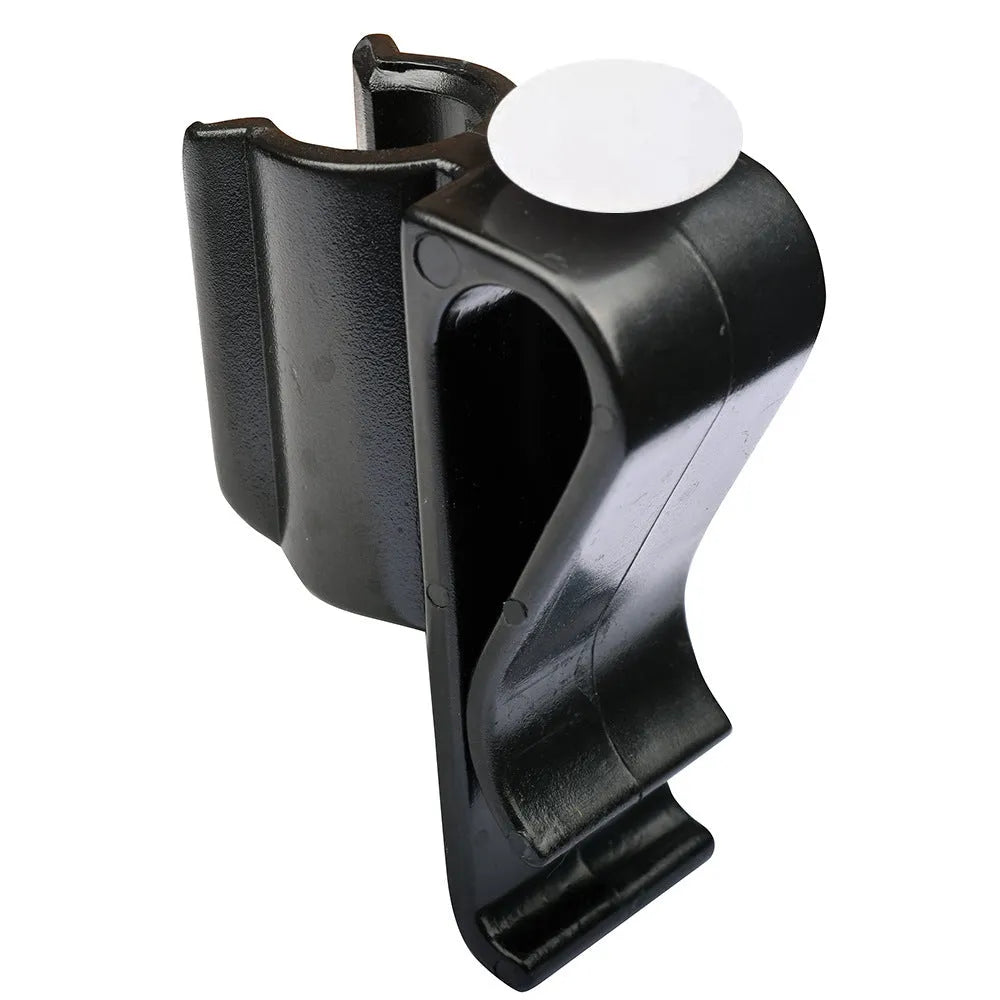 Black plastic putter fixing clip attached to golf bag, holding a putter securely