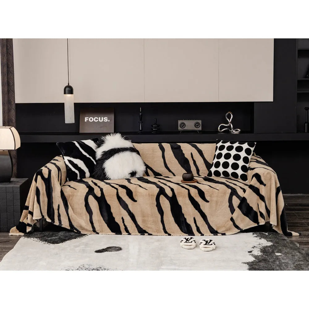 Zebra pattern flannel sofa slipcover in caramel colour showing non-slip underside and matching pillowcase