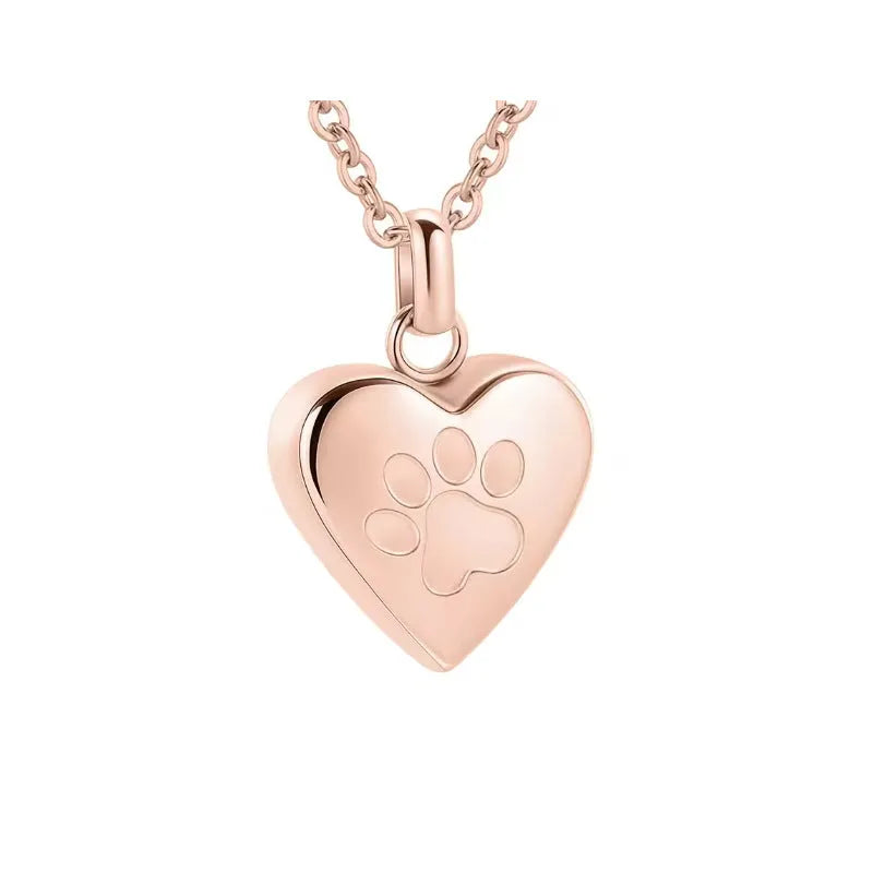 Openable heart-shaped cinerary casket necklace with paw print, made from polished titanium steel.