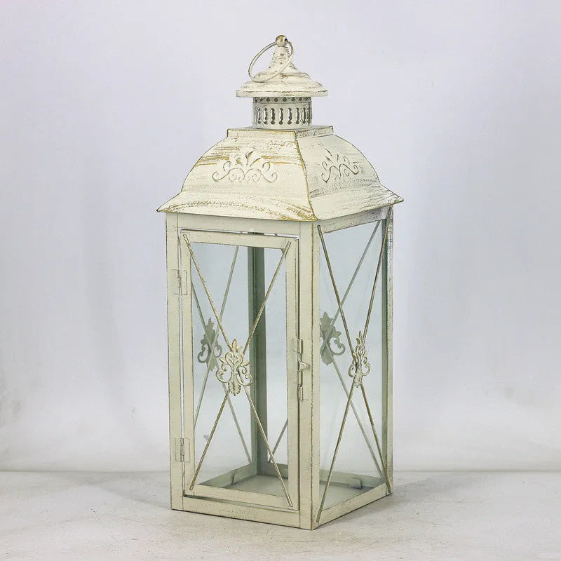 Black and white gold wrought iron storm lantern with tempered glass in three sizes for courtyard decoration.