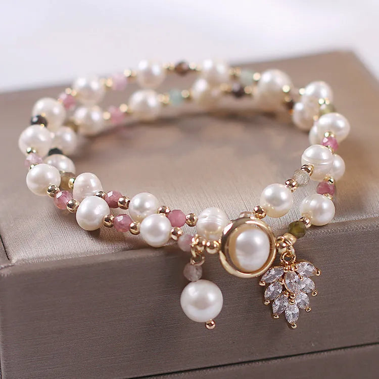 Double layer strawberry quartz bracelet with lucky cat charm and red cat's eye flowers