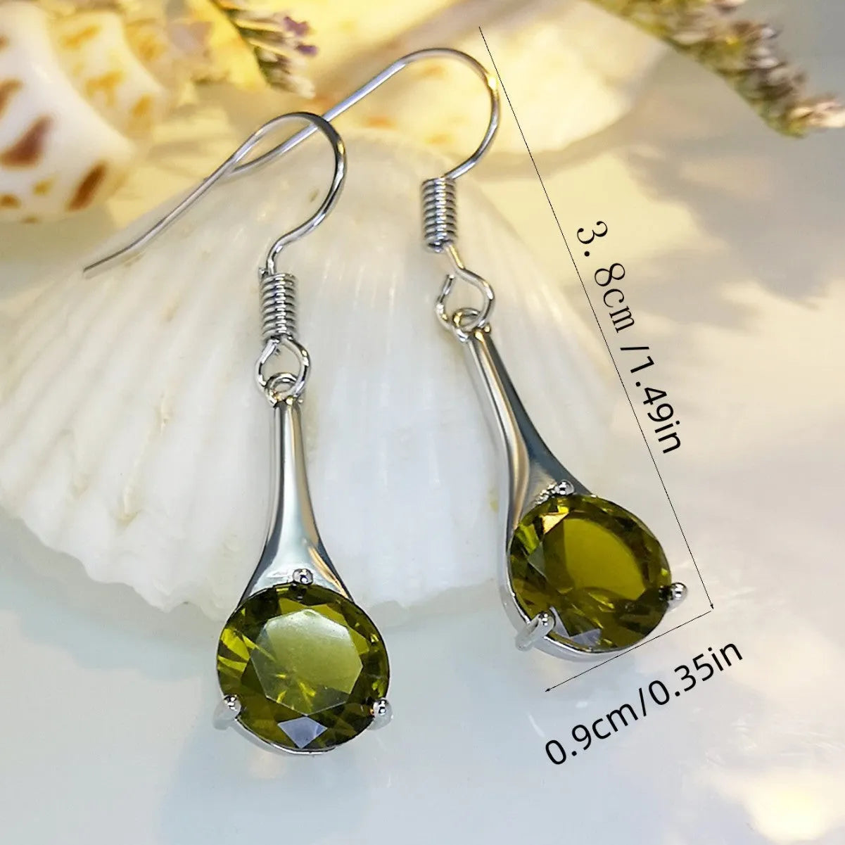 Olive green topaz earrings with water drop shape and retro style design