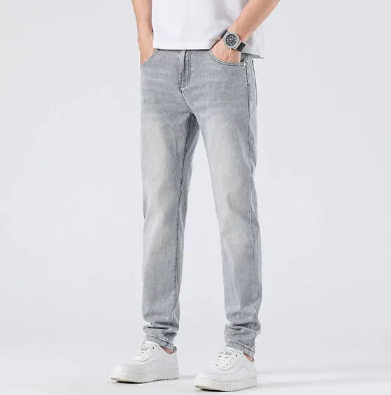 Men's light grey slim straight leg jeans with cotton no-iron finish, straight cut with small tube cuff