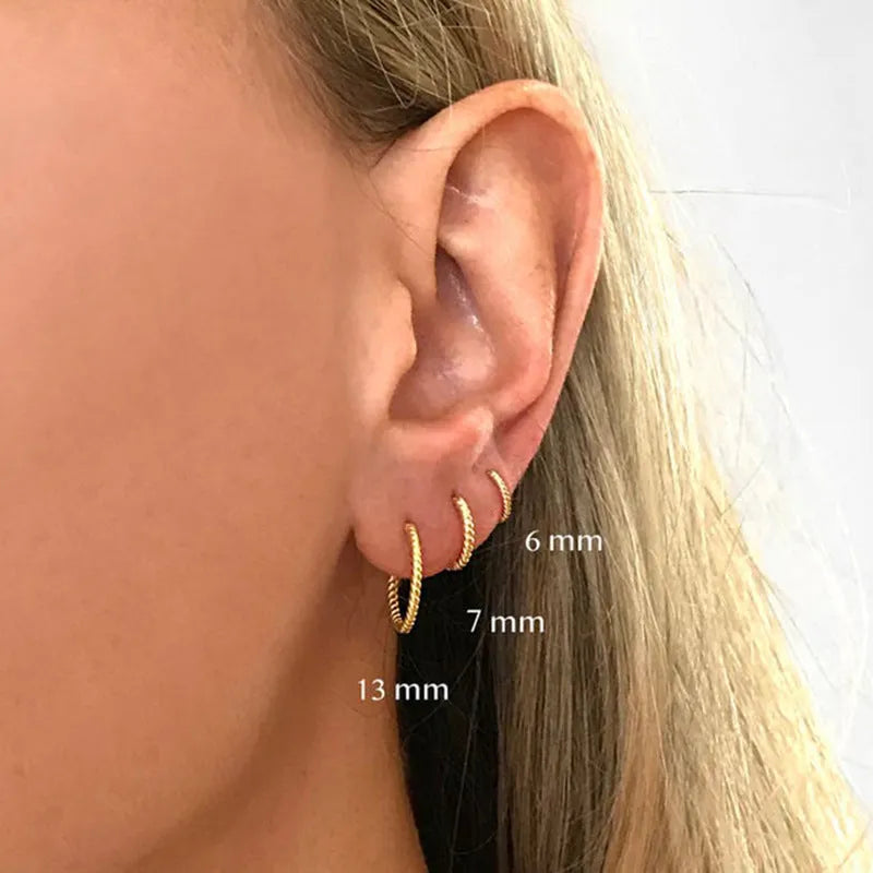 S925 Sterling Silver twisted string round ring earrings in gold or white gold plating, showing geometric design.