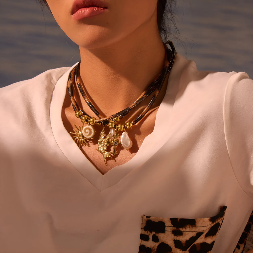 Geometric leopard pendant necklace for women in gold-plated stainless steel on an adjustable chain.