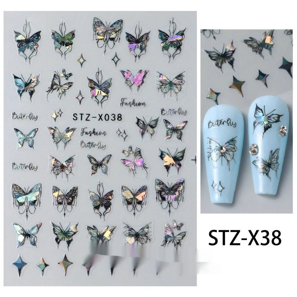 Sheet of black and silver strip nail art stickers with cartoon and love heart designs