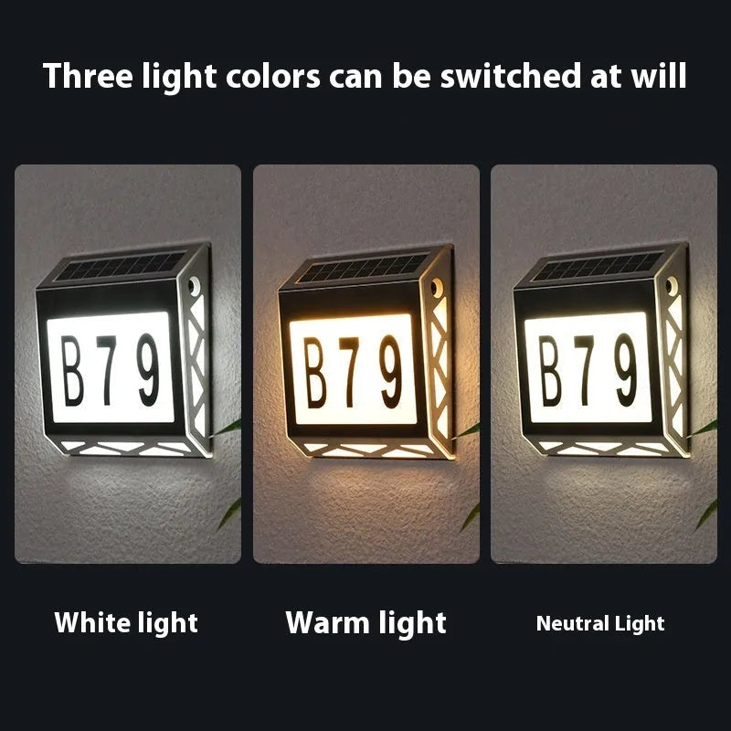 Black solar-powered metal doorplate light with LED house numbers and digital clock display