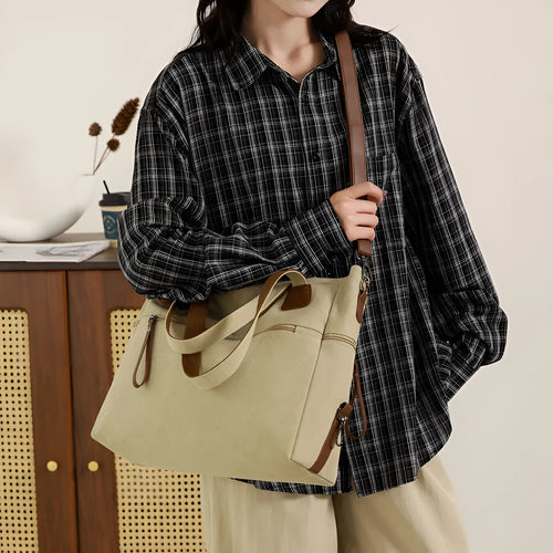 Large capacity soft canvas shoulder bag in khaki with horizontal square shape and outer sandwich pocket