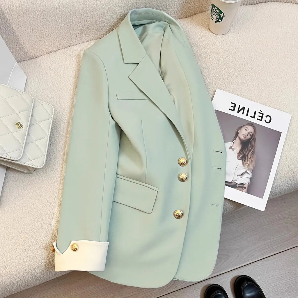Women's Korean style loose fit coat in milky white colour with pockets and long sleeves