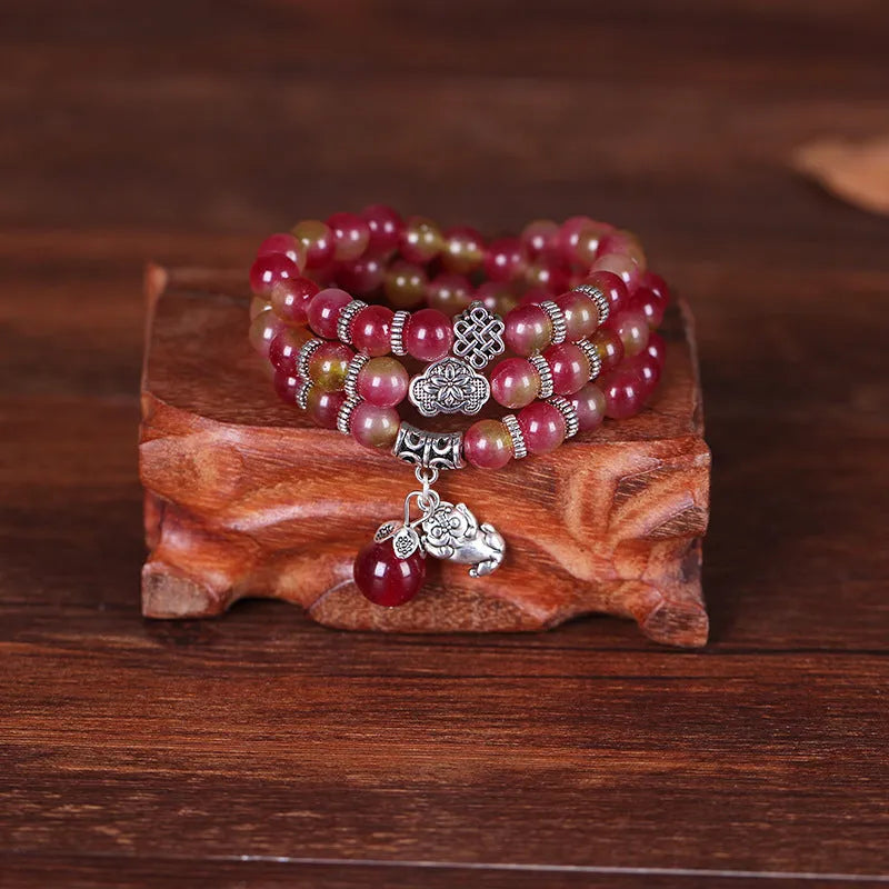 Handmade watermelon crystal bracelet with Chinese knot closure in elephant style design