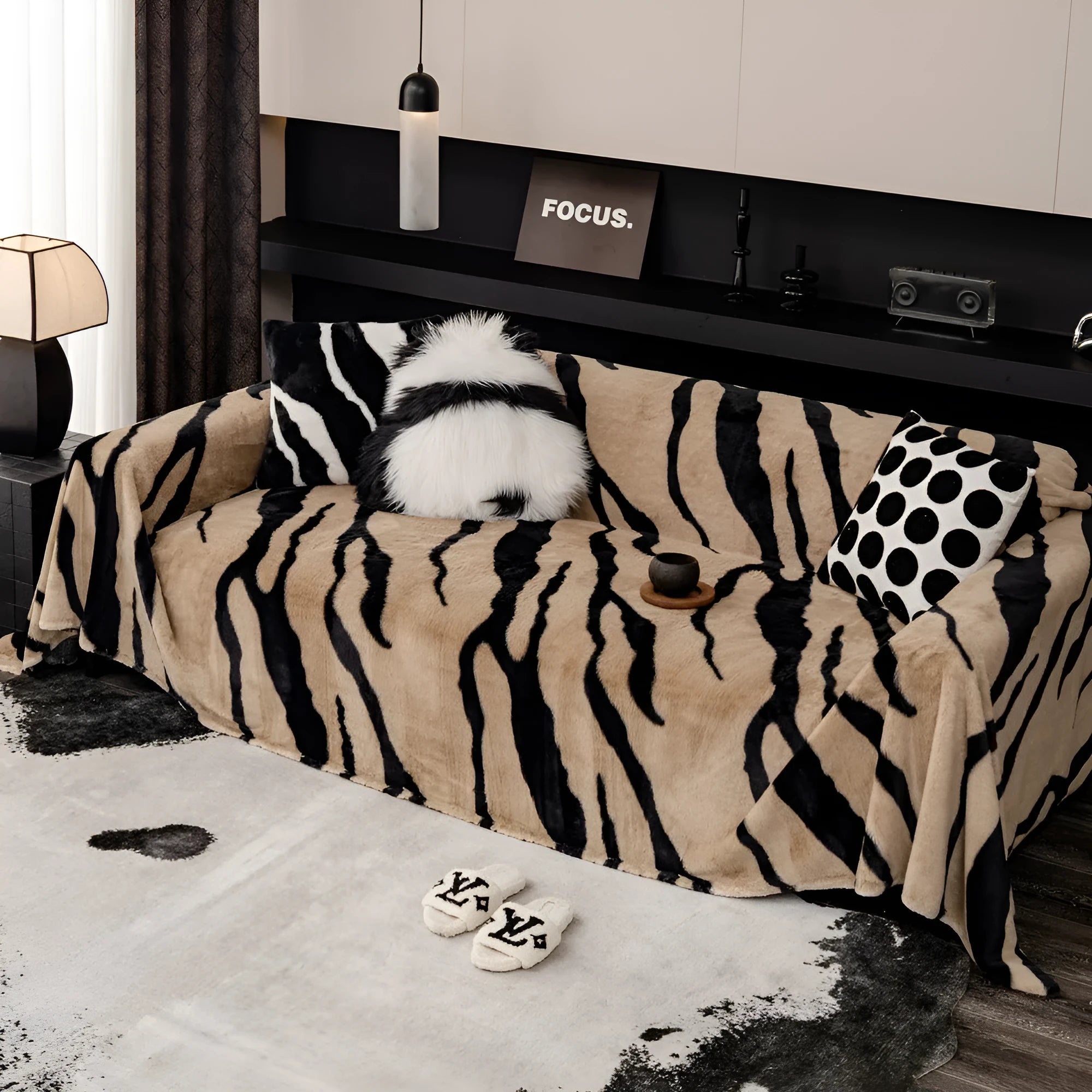 Zebra pattern flannel sofa slipcover in caramel colour showing non-slip underside and matching pillowcase