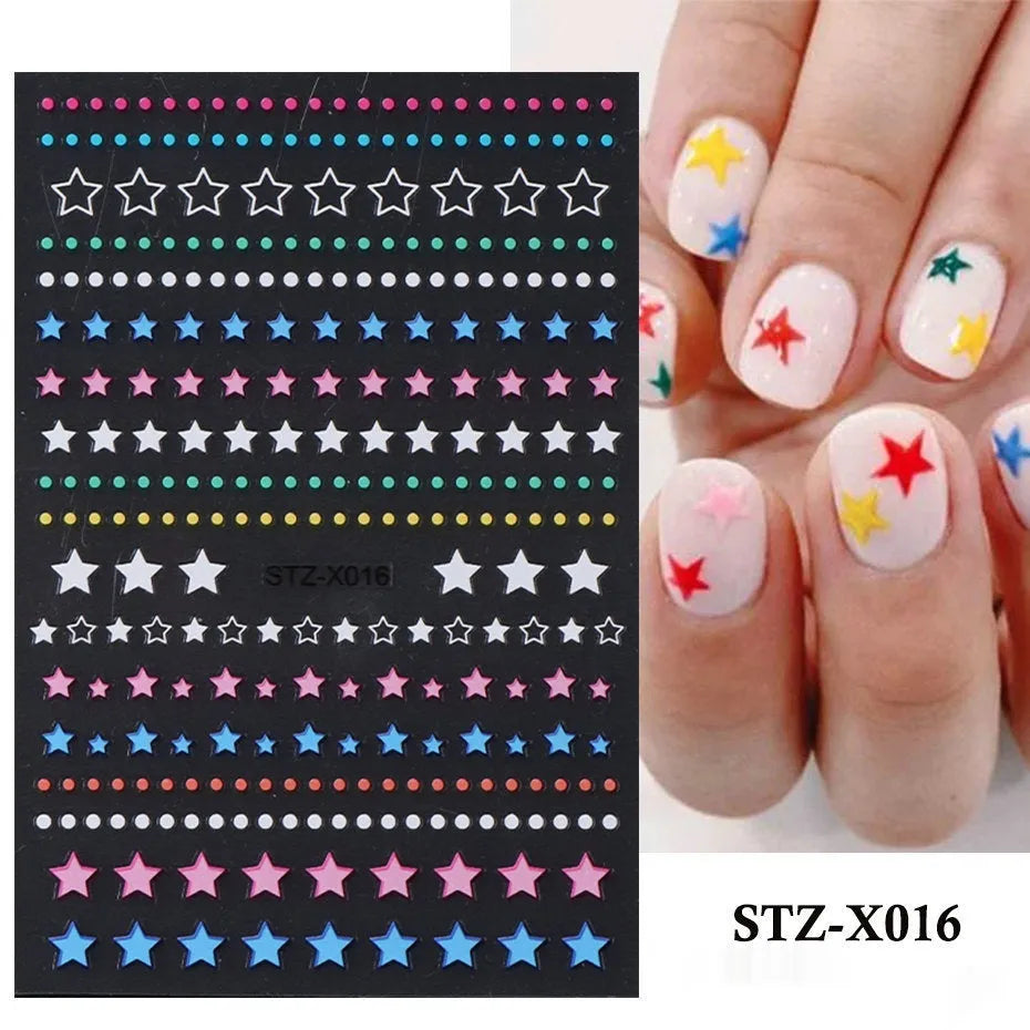 Sheet of black and silver strip nail art stickers with cartoon and love heart designs