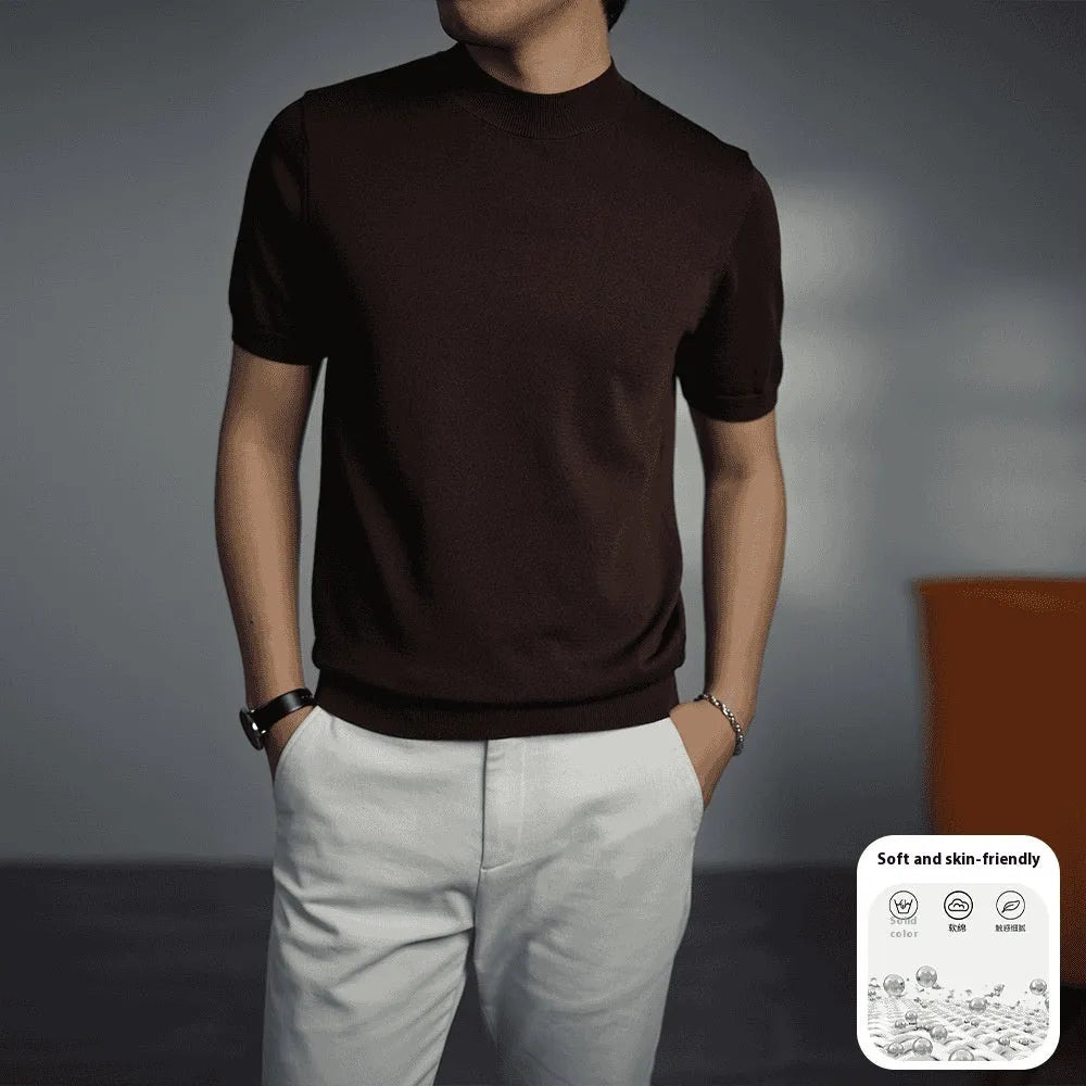 Men's solid colour knitted t-shirt with round neck and short sleeves in a polyester blend fabric.