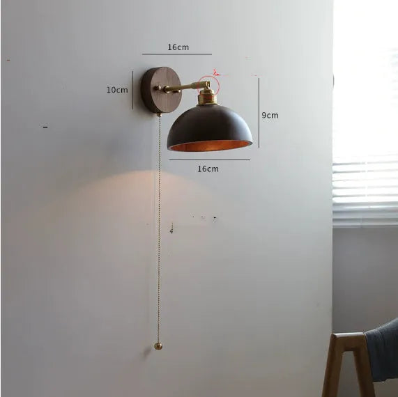 Nordic style wooden wall-mounted lamp with plug, shown in walnut colour finish.