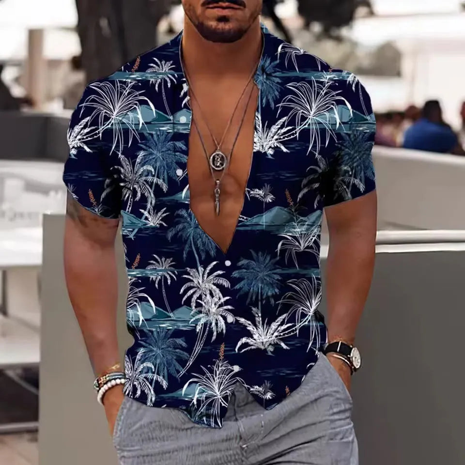 Man wearing a loose-fit short sleeve shirt with a colourful digital flower print pattern.