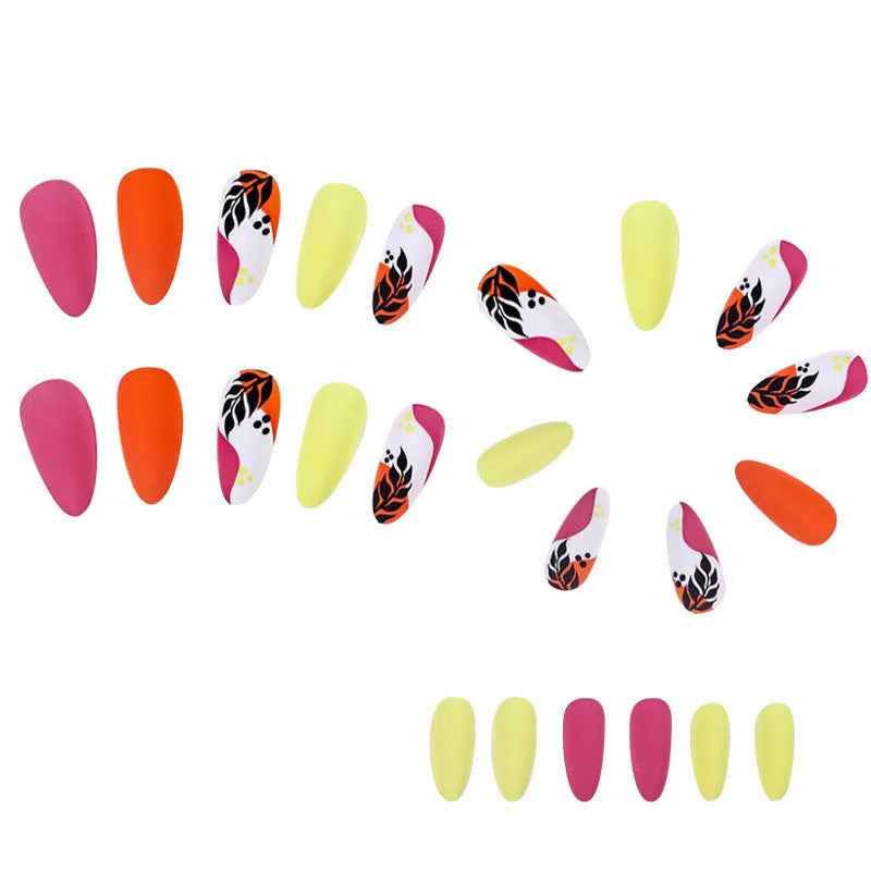 Wear Armour medium almond nail stickers in frosted French leaves, macaron, leopard print, and plating designs.