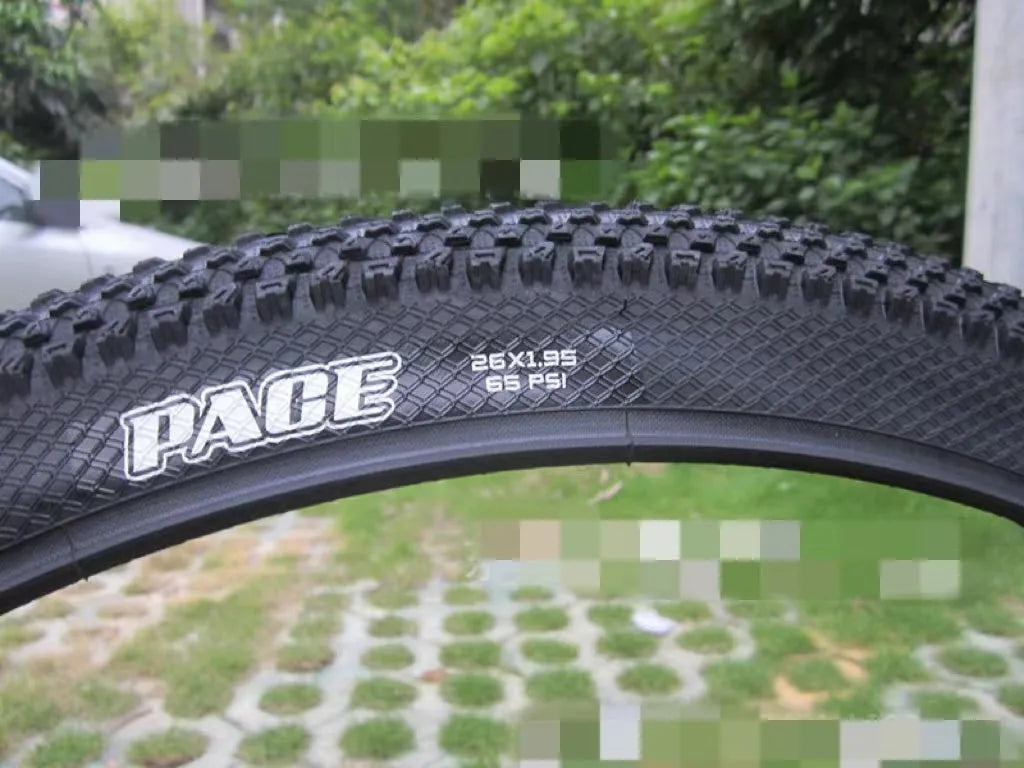 Ultralight puncture-resistant mountain bike tyre showing tread pattern and available sizes
