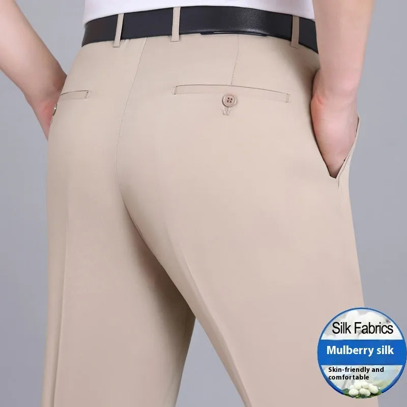 Men's straight leg formal trousers in a dark blue colour, showcasing the high waist and non-iron fabric blend.