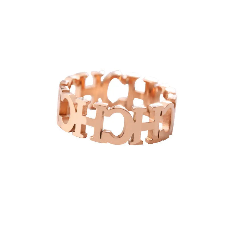 Gold titanium steel hollowed cut letter ring in unisex geometric Korean style, sizes 6-9