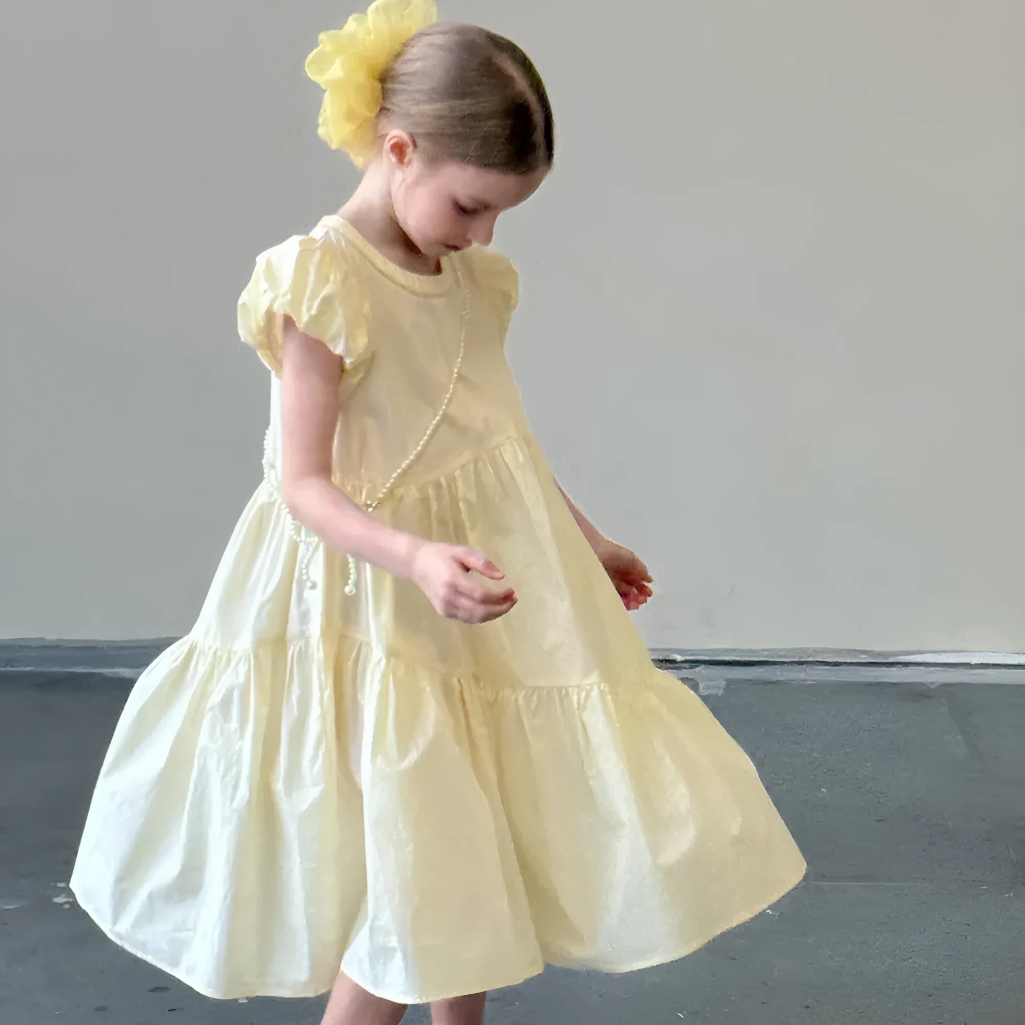 Light yellow cotton princess dress with short puff sleeves and pearl chain for girls, summer style