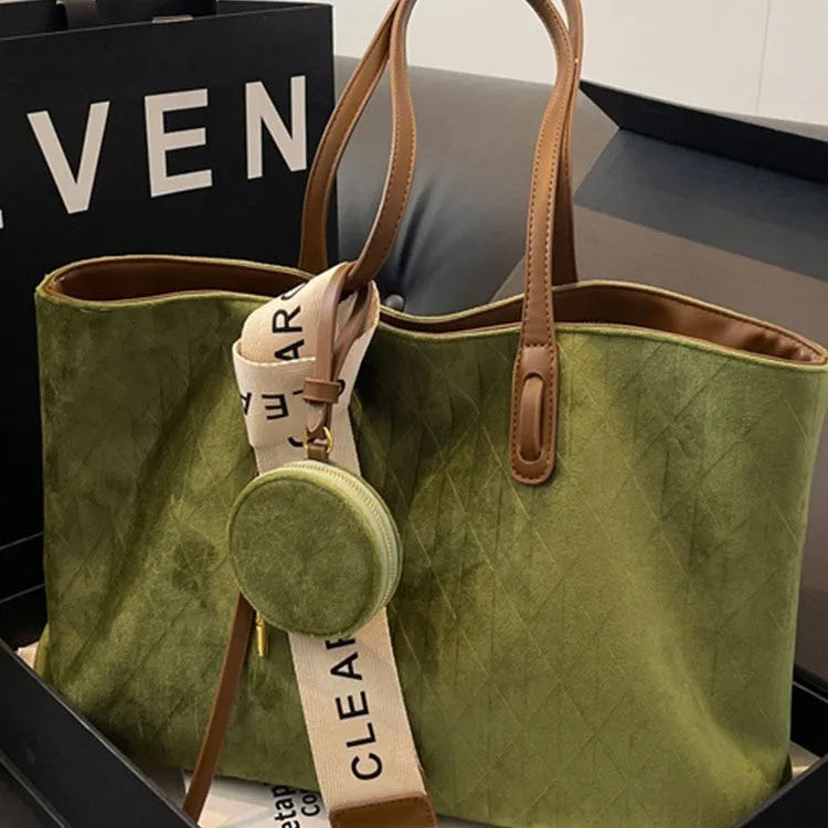 Large casual tote bag with shoulder strap in horizontal square shape with zippered internal compartment