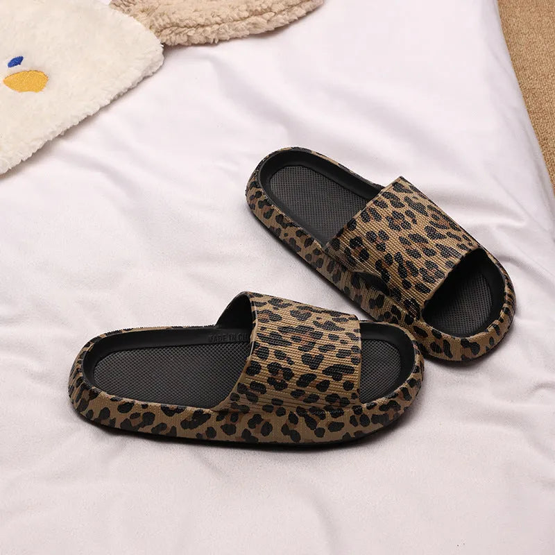 Women's leopard print EVA slippers with thick sole on a white background.